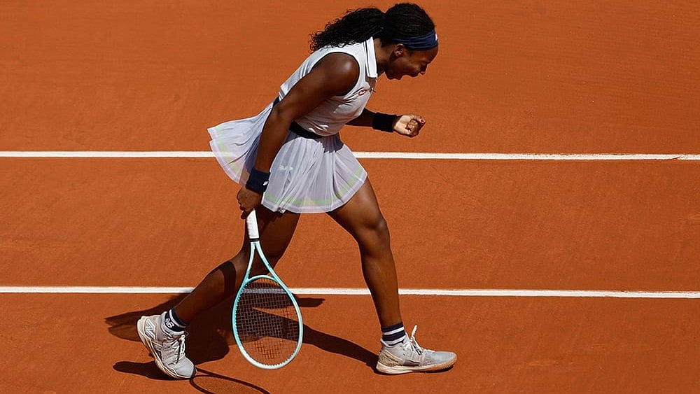 Coco Gauff celebrates after scoring a point  - | Photo: AP/Aurelien Morissard